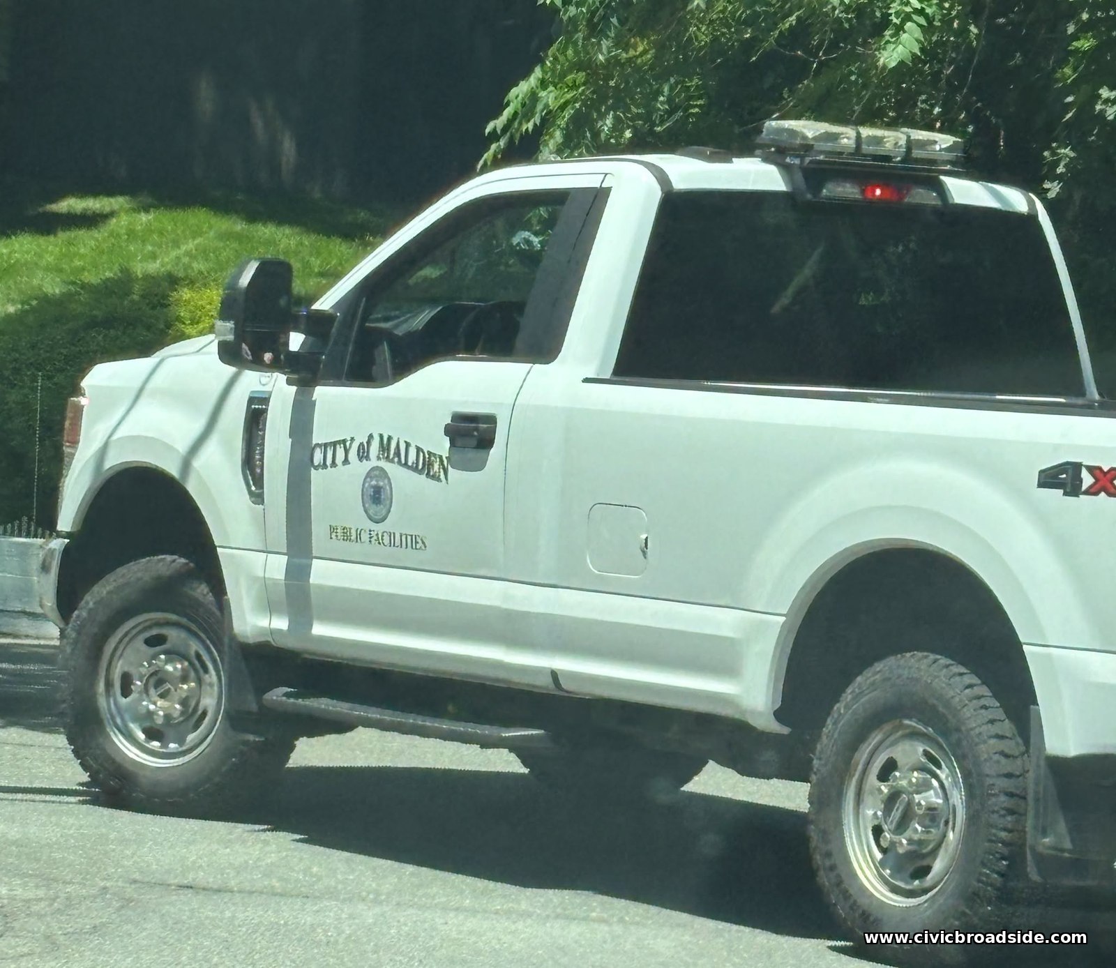 Public Facilities truck traveling from Malden to Melrose on Sunday, June 28, 2026