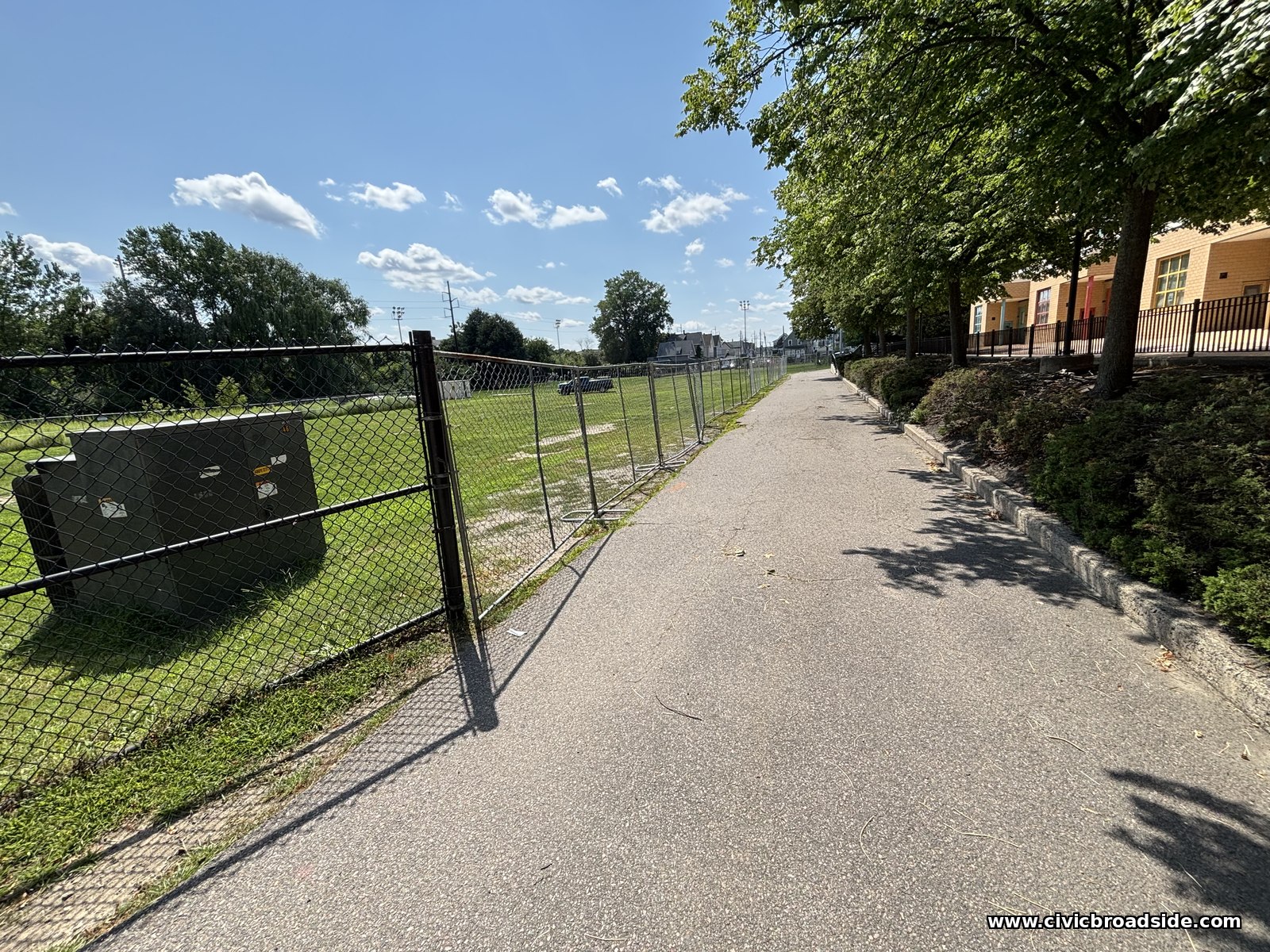 Construction fencing along the path beside Salemwood School at Roosevelt Park